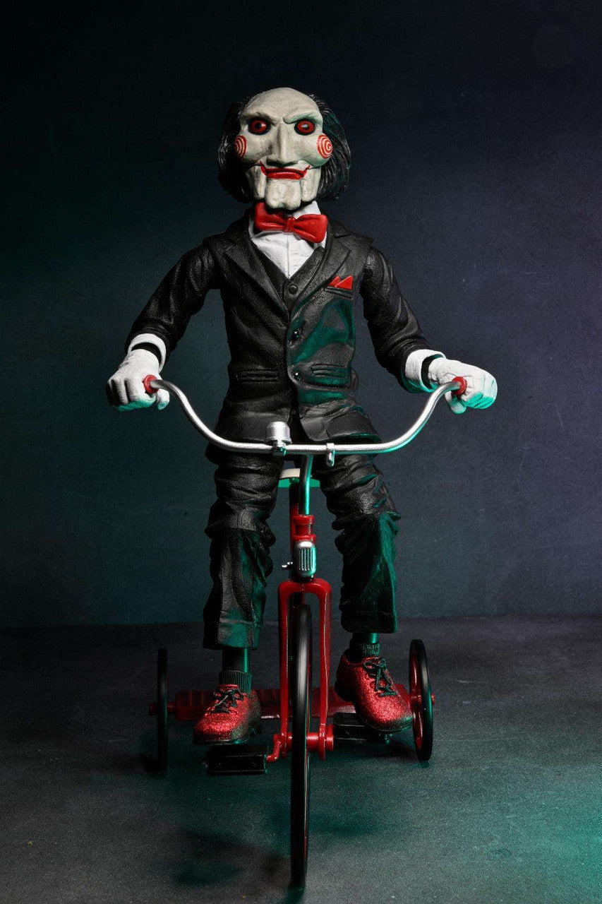 NECA Figura de Accion: Saw - Billy en Triciclo con Sonido 12 Pulgadas