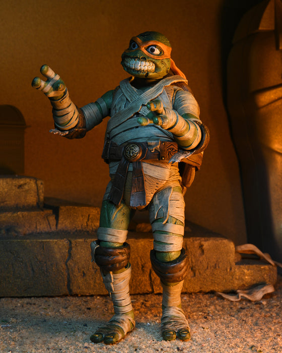 NECA Figura de Accion Ultimate: Universal Monsters X TMNT - Mike Como La Momia 7 Pulgadas