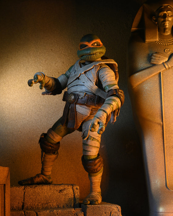 NECA Figura de Accion Ultimate: Universal Monsters X TMNT - Mike Como La Momia 7 Pulgadas